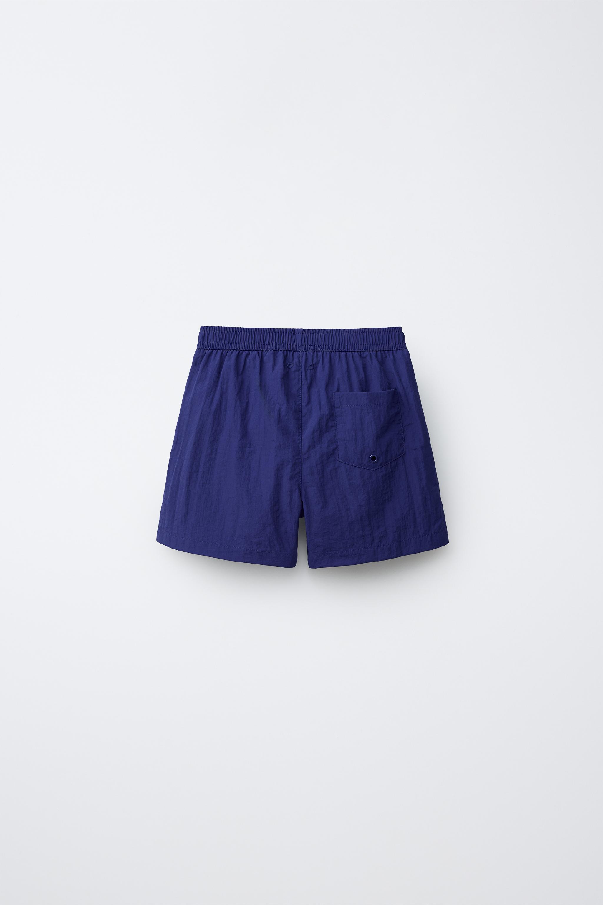 AGES 6-14 / SWIM SHORTS WITH STOPPER